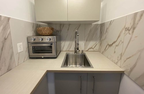 West Little River Apartment | Cozy Cabin with private fenced garden in Miami. Kick back and relax here.