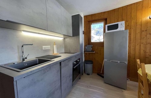 Praz-sur-Arly Apartment | 300m from resort center, 1st floor, view mountain, balcony, parking, tv, ski locker, 29m²