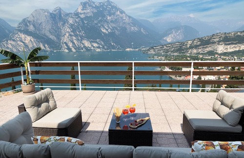 Torbole sul Garda Apartment | Exclusive residence in Torbole with breathtaking views, large terrace.