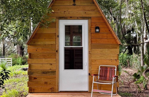 Reddick Cabin | Grass Campers whimsical 1 room Glamping Forest Hideaway Sugar Shanty near WEC