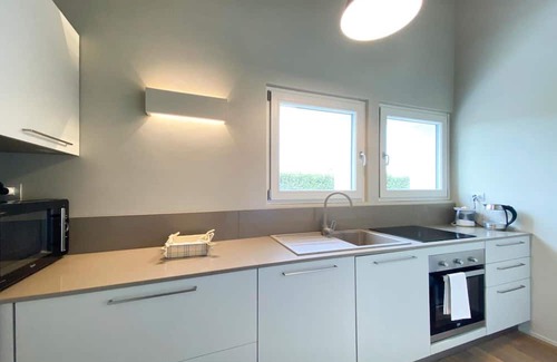 Ponti sul Mincio Apartment | Apartment 'Time To Relax Resort - Melograno' with Shared Pool, Wi-Fi and Air Conditioning