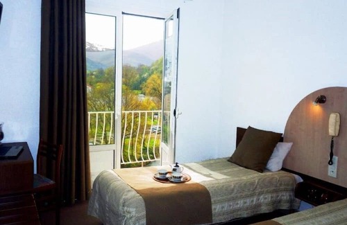 Lourdes Hotel | Serene & Spacious Unit with Balcony, Free Parking, Onsite Restaurant!