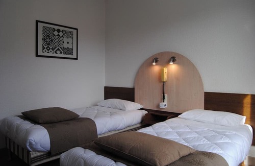 Lourdes Hotel | Serene & Spacious Unit with Balcony, Free Parking, Onsite Restaurant!