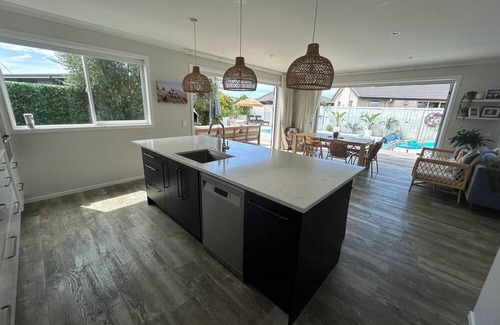 Papamoa Beach House | Stunning Family Home with Pool, Spa & Walk to Beach in Papamoa