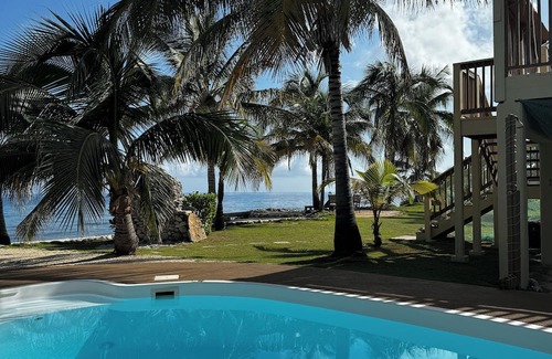 West End House | Secluded Sunsets 3400 Sq Ft Villa with 3 Separate Suites on the Ocean with Pool!