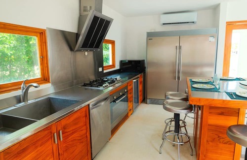 Playa Blanca House | Spacious 5-bedroom luxury villa with pool, golf view & Steps from the beach.