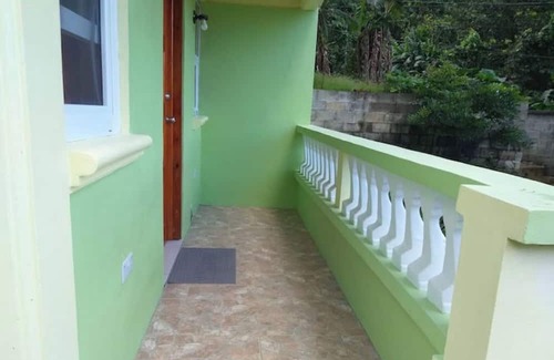 Trafalgar Apartment | Serene 2-bedroom apartment with AC in Saint George Parish