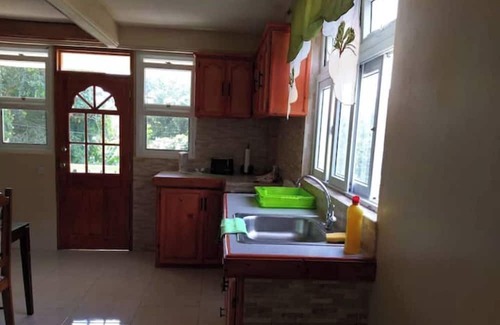 Trafalgar Apartment | Serene 2-bedroom apartment with AC in Saint George Parish
