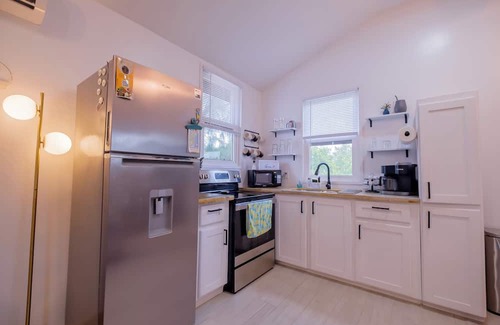Caye Caulker Apartment | Two story house with king size bed in beautiful Caye Caulker