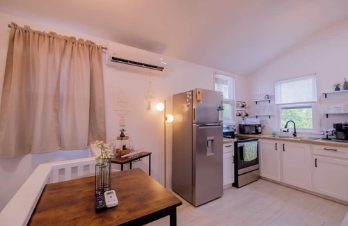 Caye Caulker Apartment | Two story house with king size bed in beautiful Caye Caulker