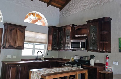 San Ignacio House | Enchanting Riverside Jungle Village Bungalow: Pool, A/C, WiFi, TV, Kayaks & More