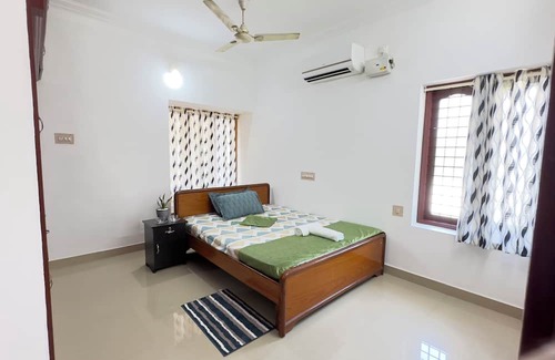 Thiruvananthapuram House | Halcyon Homes - Delightful 2-bedroom house with AC in Thiruvananthapuram