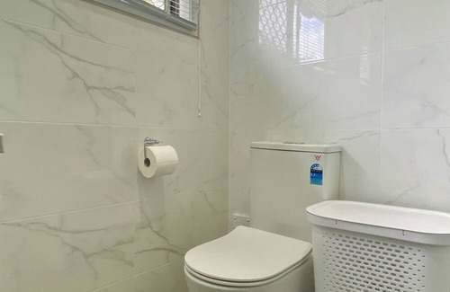 Centenary Heights Apartment | Modern Studio Room Retreat with a reverse Aircon