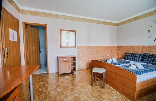 Trnovska House | Cozy Triple Room with Balcony at Siva čaplja