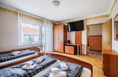 Trnovska House | Cozy Triple Room with Balcony at Siva čaplja