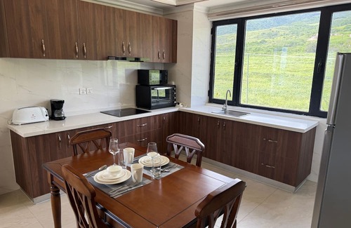 Challengers Hotel | Charming 1-bedroom hotel in fabulous Trinity with AC