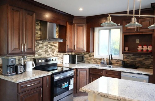 Brampton West House | Poolside Retreat with Private Patio