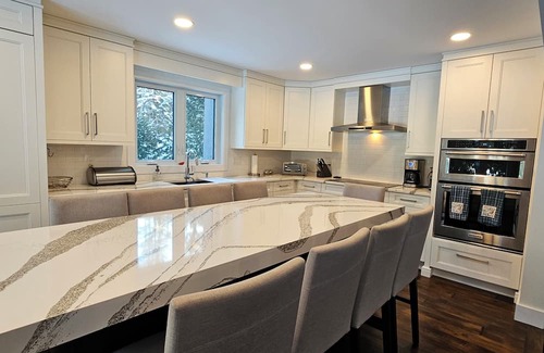 Feronia House | Beautiful home on Trout Lake with hot tub and movie room
