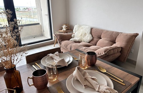 Puerto Natales Apartment | Dpto El Ovejero, ideal for a romantic getaway.