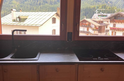 Auronzo di Cadore Apartment | Gorgeous wooden attic room with wonderful view of Lake Auronzo