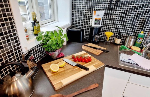Engen Apartment | Prime location, amazing king bed, colorful oasis