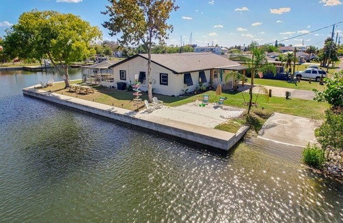 Sea Ranch House | "Stay Salty" Florida Pool/Canal Home, 4 bed, 3.5 bath, bring boat!