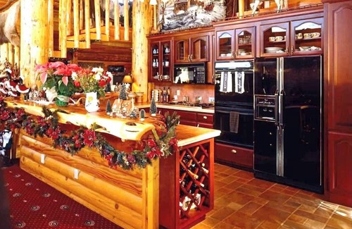 Bayfield House | Iconic Trout House Charming 4-bedroom Log Chateau 6 Fireplaces 5 Baths 5,250 Ft