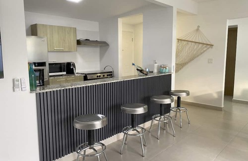 El Palmar House | 2-bedroom family-friendly house in Las Lajas-Chame with backyard and small pool.