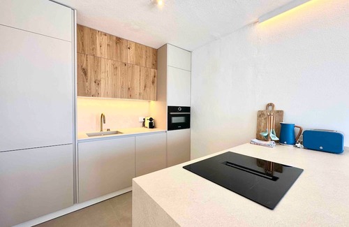 Arenal d'en Castell Apartment | Apartment 'Poblado Marinero' with Balcony, Wi-Fi and Air Conditioning