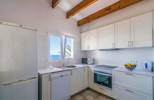 Marina de Son Ganxo Villa | Spectacular and spacious villa on the seafront, close to the beach.
