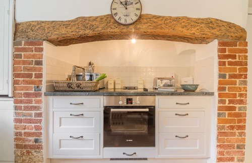 Ebbesborne Wake Cottage | This beautiful 300-year-old detached thatched cottage nestled within the stunning Cranborne Chase.