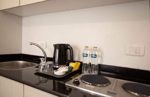 New Cairo Apartment | Compact Twin Bed Studio with City Views and Full Amenities, Near AUC