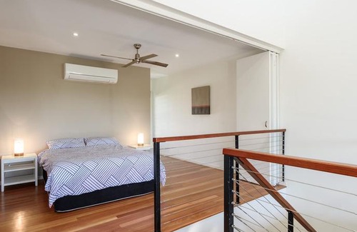 Rainbow Beach Villa | Unit 2 Rainbow Surf - Modern double storey townhouse with large shared pool close to beach and shops