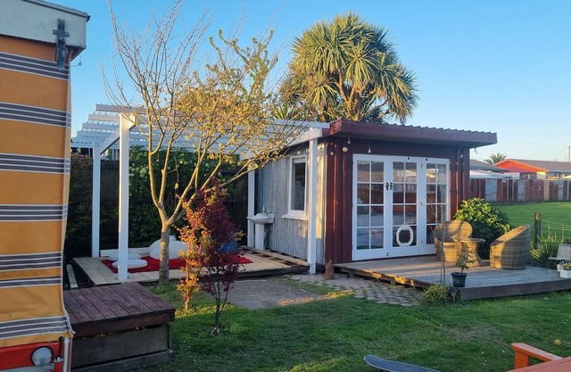 Unique, delightful Tiny Home with Alfresco living area including retro Poptop.