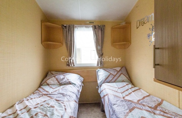 6 berth caravan to hire at St Osyth Beach Holiday Park in Essex ref 28015D