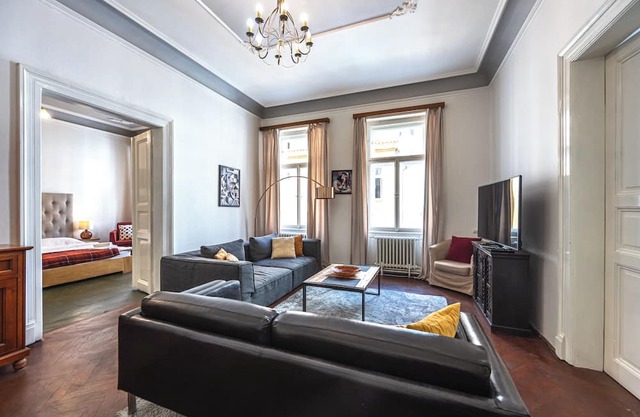 Charming Balcony Retreat – 1 min from Old Town Square