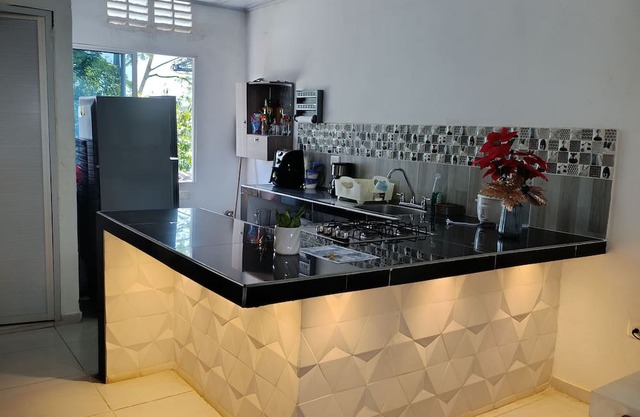 Spacious 2-bedroom cottage in tranquil Doradal Antioquia with AC, WiFi