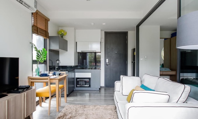 Patong Apartment | Walk to Patong Beach from a Sleek, Daylit Apartment