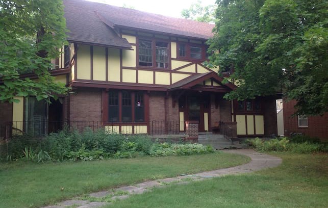 Des Moines House | Red room in Casual Tudor Revival.