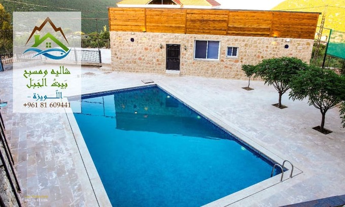 Iqlim al Tuffah Villa | شاليه ومسبح بيت الجبل
