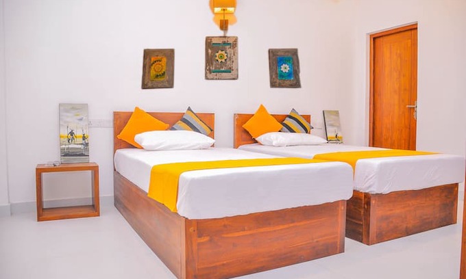 New Town Resort | Amuththa Resort- Room Blossom