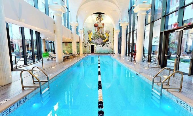 East Williamsburg Condo | Electrifying 1-bedroom condo with Bowling, Pool, Theater and Rock Climbing!