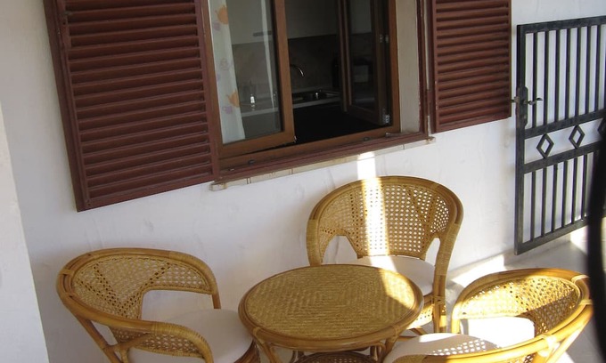 Siniscola House | Holiday Home 'Capo Comino A Due Passi Dal Mare' with Sea View, Private Terrace and Private Garden
