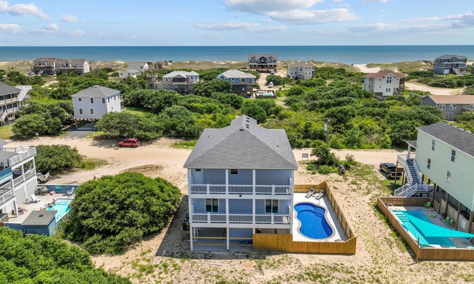 Carova Beach Cottage | Brand New Beach House with Ocean Views, Elevator, Game Room and Inground Pool!