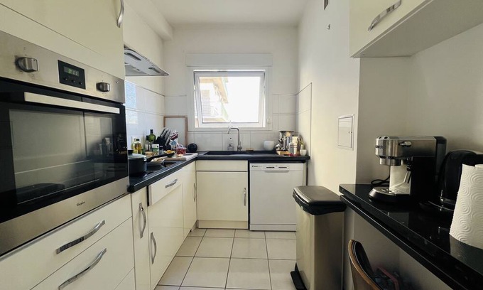 Republique–Point-du-Jour Apartment | Comfortable apartment at Porte de Saint-Cloud