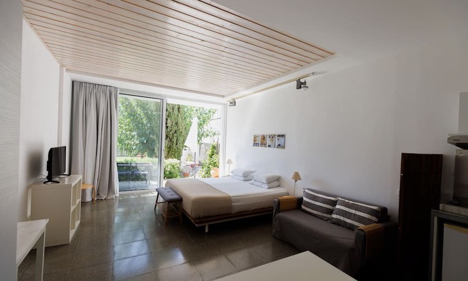 Pentakomo Apartment | Eupnea | Studio Apartment, Art by PraXis Apartments