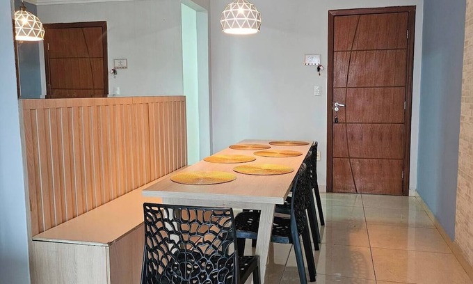 Contagem Apartment | Apartment 1 km from the beach with air conditioning and garage