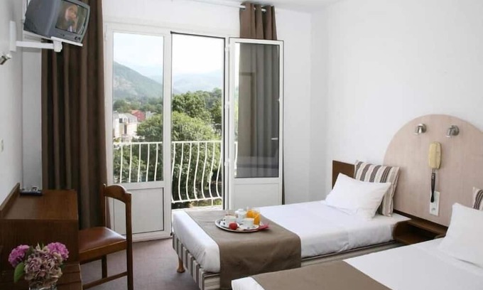 Lourdes Hotel | Serene & Spacious Unit with Balcony, Free Parking, Onsite Restaurant!