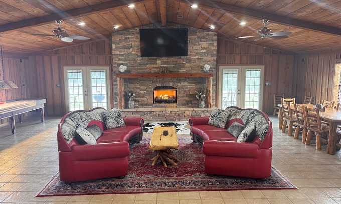 Panola County Cabin | Private Lake Lodge on 104 acres with bar, pool table, shuffle board and more!
