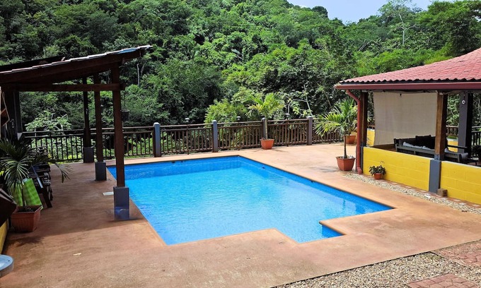San Ignacio House | Enchanting Riverside Jungle Village Bungalow: Pool, A/C, WiFi, TV, Kayaks & More